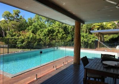 Glass protection beside swimming pool construction