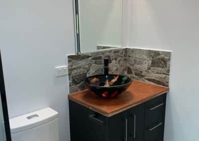 Stone, black and Wood Theme Bathroom